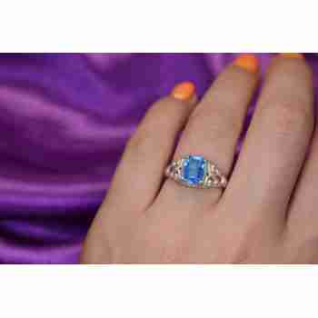 Sky Jewelry Серебряное кольцо с голубым Топазом