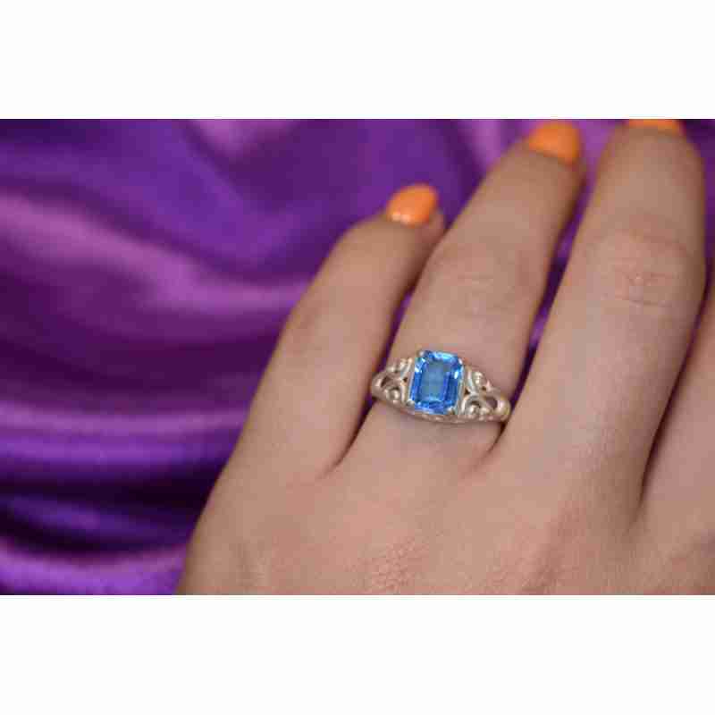 Sky Jewelry Серебряное кольцо с голубым Топазом