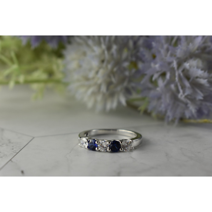 Sky Jewelry Серебряное кольцо с синими Топазами и Фианитами