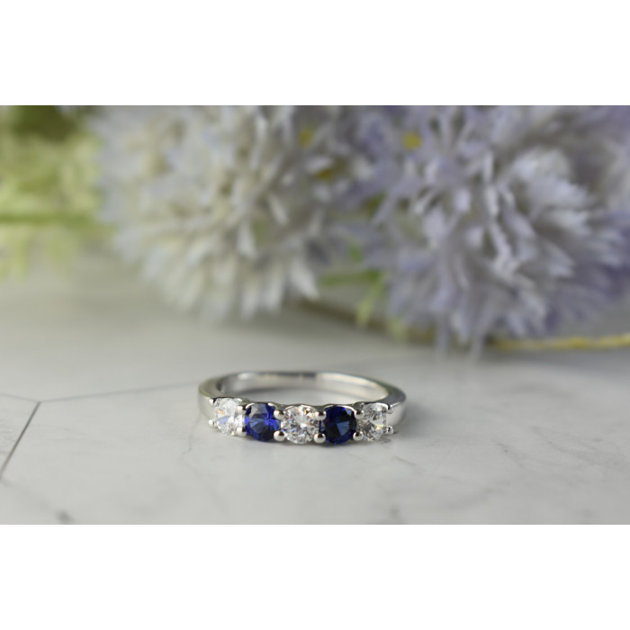 Sky Jewelry Серебряное кольцо с синими Топазами и Фианитами