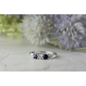 Sky Jewelry Серебряное кольцо с синими Топазами и Фианитами