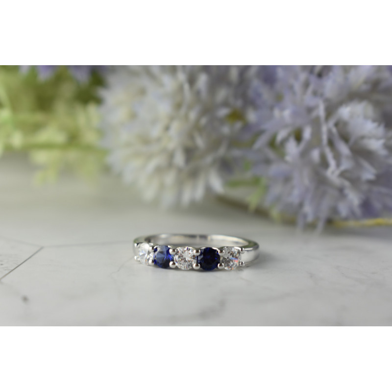 Sky Jewelry Серебряное кольцо с синими Топазами и Фианитами