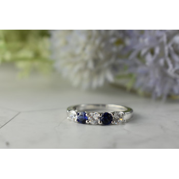 Sky Jewelry Серебряное кольцо с синими Топазами и Фианитами