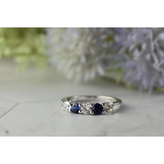 Sky Jewelry Серебряное кольцо с синими Топазами и Фианитами