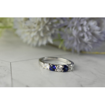 Sky Jewelry Серебряное кольцо с синими Топазами и Фианитами