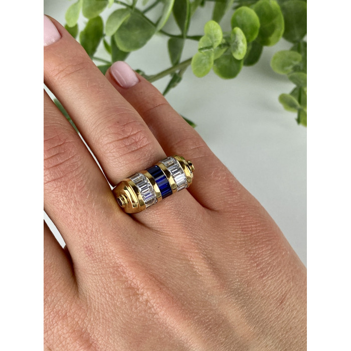 Sky Jewelry Серебряное кольцо в позолоте с сапфирами и фианитами  Уникальность