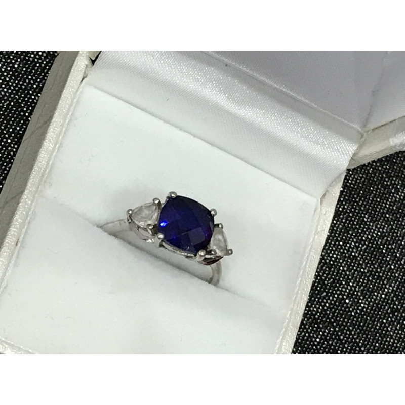 Sky Jewelry Серебряное кольцо с синим топазом и фианитами