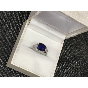 Sky Jewelry Серебряное кольцо с синим топазом и фианитами