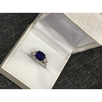 Sky Jewelry Серебряное кольцо с синим топазом и фианитами