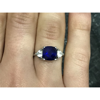 Sky Jewelry Серебряное кольцо с синим топазом и фианитами