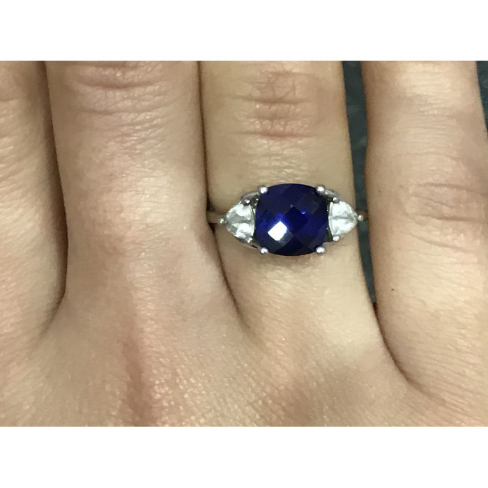 Sky Jewelry Серебряное кольцо с синим топазом и фианитами