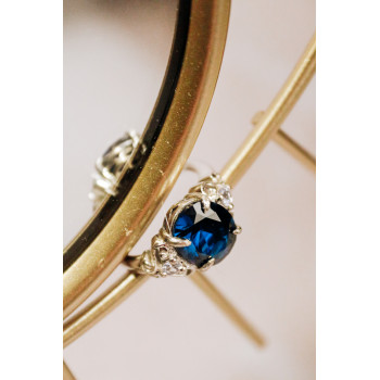 Sky Jewelry Серебряное кольцо с сапфиром и камнями иолит