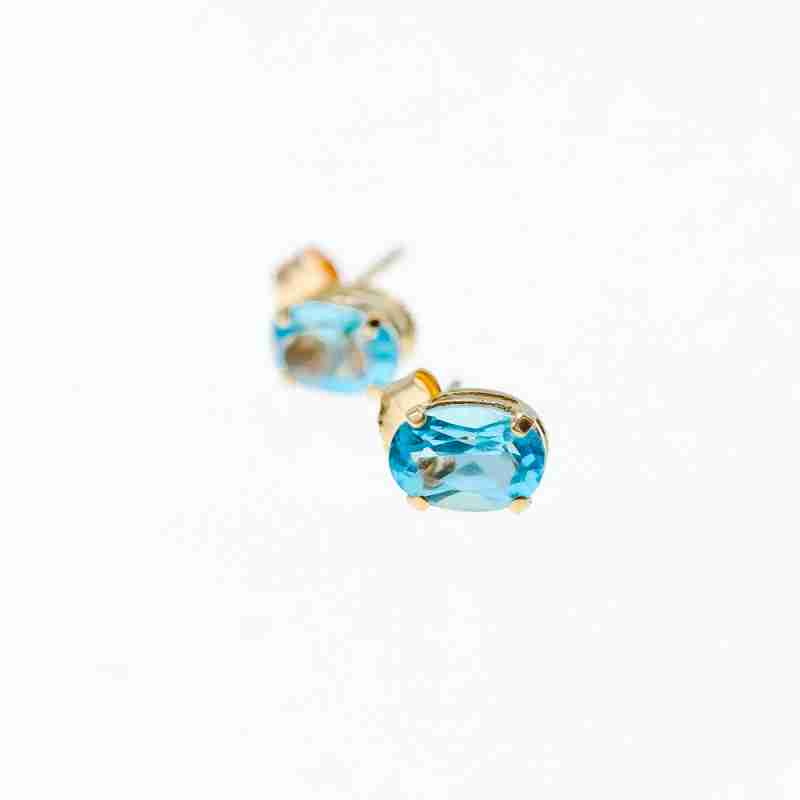 Sky Jewelry Золотые серьги гвоздики с топазом